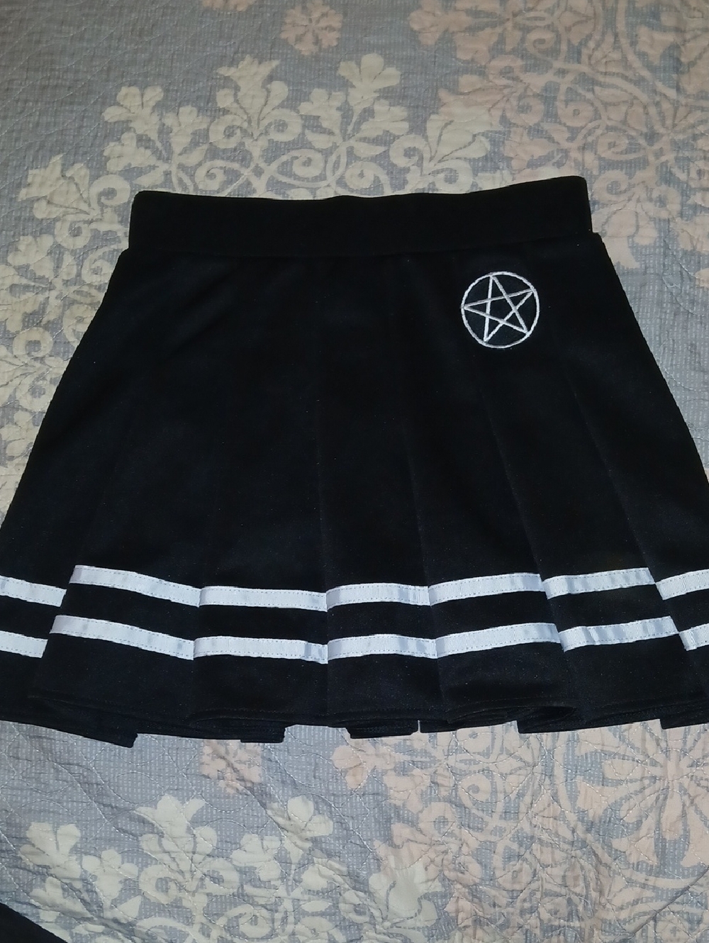 Black Pleated Mini Skirt with White Stripe Detail